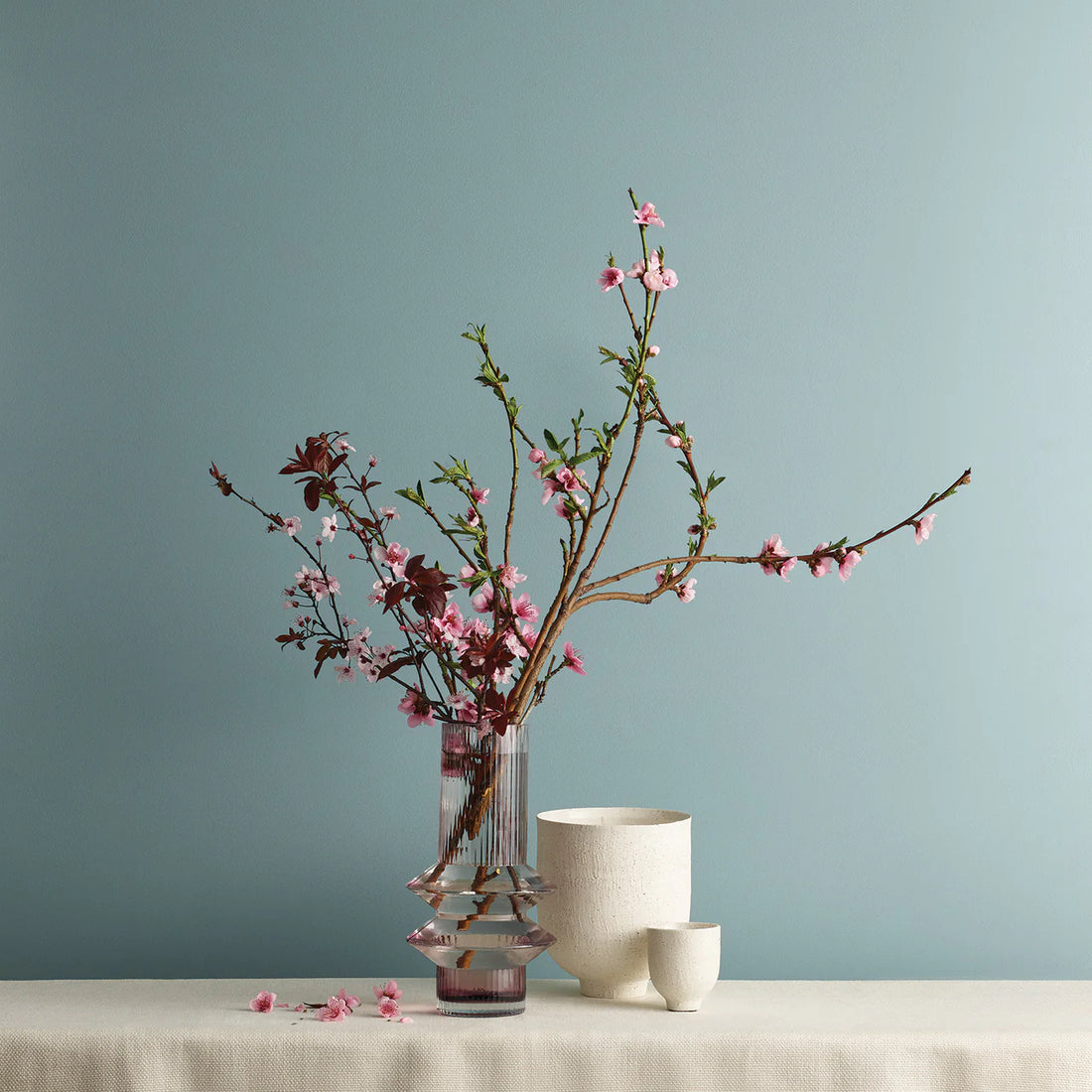 the best looking bathroom one can imagine. The Color HAILSTORM is a simple and elegant color choice for any space.  Flowers in a vase with ceramic wares.