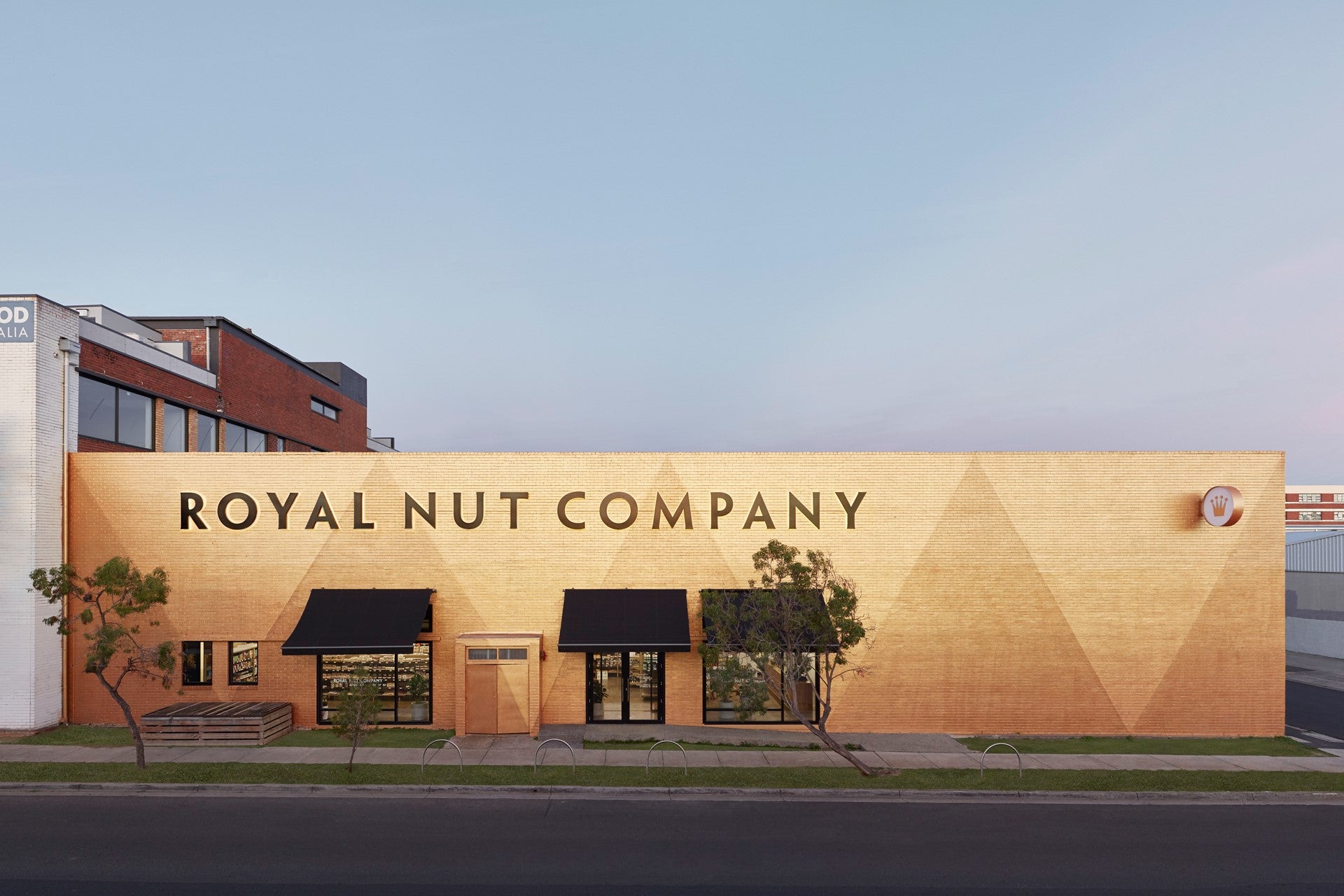 the Royal Nut Company in Brunswick is painted in a dramatic zig zag of &quot;Temple Gold&quot; and &quot;Imperial&quot;
