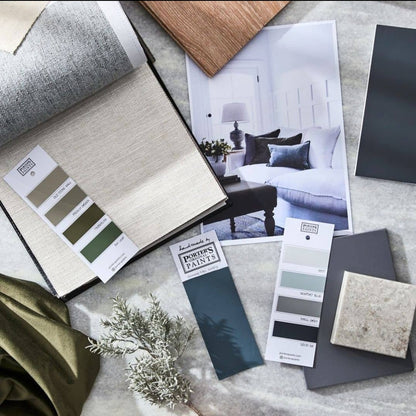 Color swatches and design samples on a surface